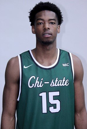 Young man wearing a green basketball jersey with 'Chi-state' and the number 15, standing against a plain background.